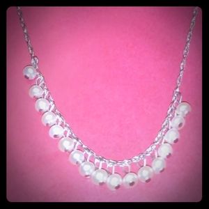 White gold with natural saltwater pearl necklace.